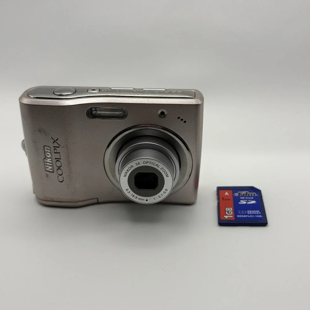Nikon Coolpix L14 7.1 Megapixel Digital Camera Silver W/ 1gb Mem Card - Tested